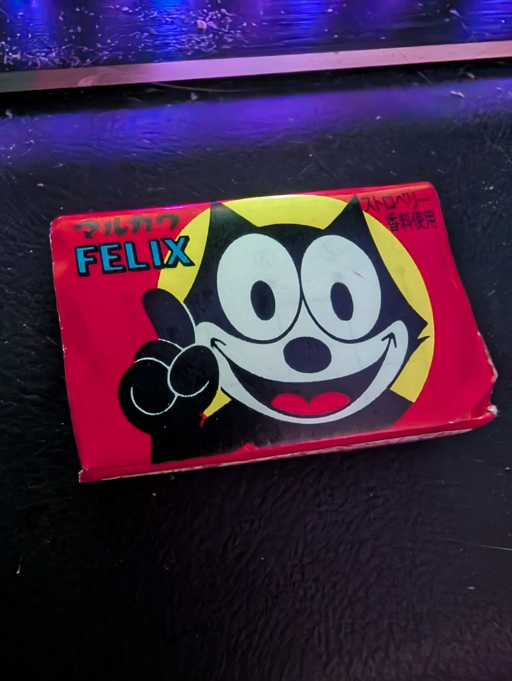 Felix the Cat branded gum sitting on a desk